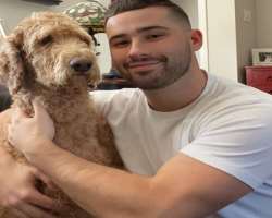He is fond of dogs and as reared one as well He is fond of dogs and as reared one as well.